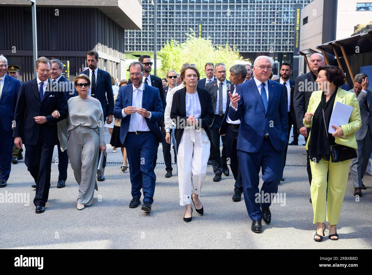 Luxemburg, Luxembourg. 11th July, 2023. Federal President Frank-Walter Steinmeier (2nd from right) and his wife Elke Büdenbender (3rd from right), together with Grand Duke Henri of Luxembourg (l) and Grand Duchess Maria Teresa of Luxembourg (2nd from left), visit the City of Science and are guided around the site by Daniela Di Santo (r), Director of the Fonds Belval, and Jens Kreisel (3rd from left), Rector of the University of Luxembourg. President Steinmeier and his wife are in Luxembourg for a two-day official visit. Credit: Bernd von Jutrczenka/dpa/Alamy Live News Stock Photo