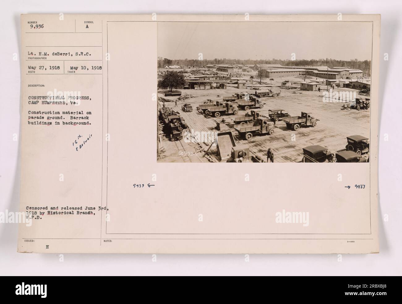 Construction material on parade ground at Camp Humphreys, VA. Barrack buildings can be seen in the background. Photo taken on May 27, 1918, by Lt. E.M. deBerri. This image was censored and released on June 3rd, 1918, as part of the Historical Branch's records. Stock Photo