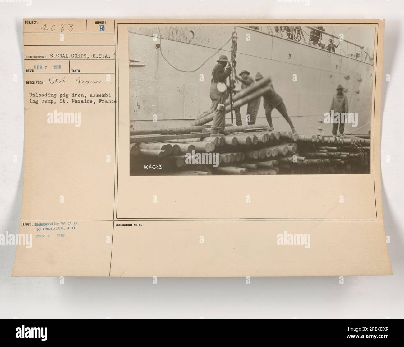 Soldiers unloading and assembling a camp in St. Nazaire, France during ...