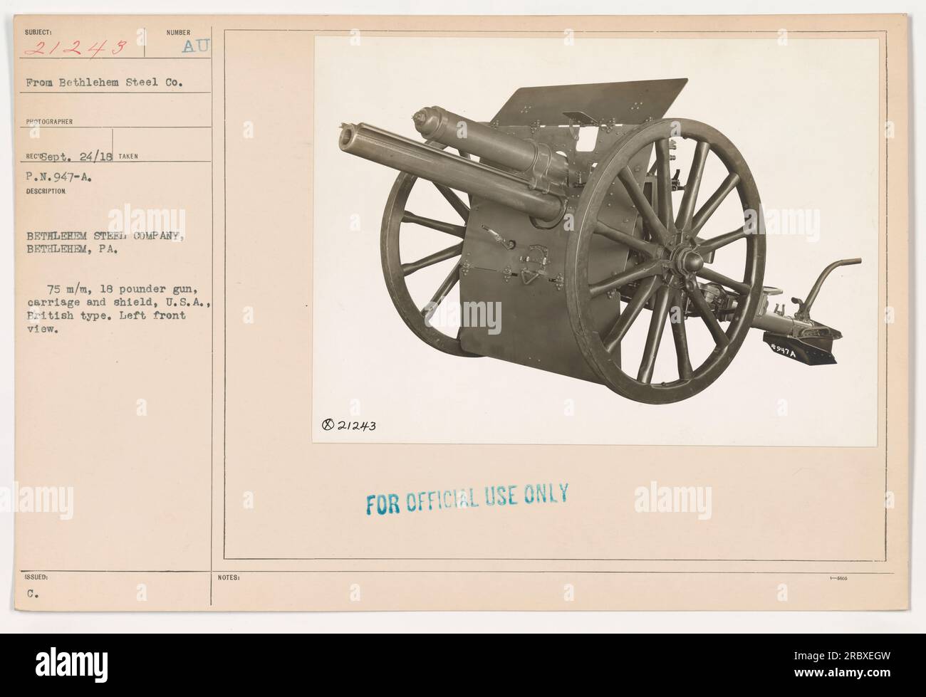 The image shows a 75 mm, 18-pounder gun from Bethlehem Steel Company in Bethlehem, PA. The gun is mounted on a carriage and is equipped with a shield. It is a US version of the British-type gun. The photograph is labeled '21243 FOR OFFICIAL USE ONLY 4947A.' Stock Photo