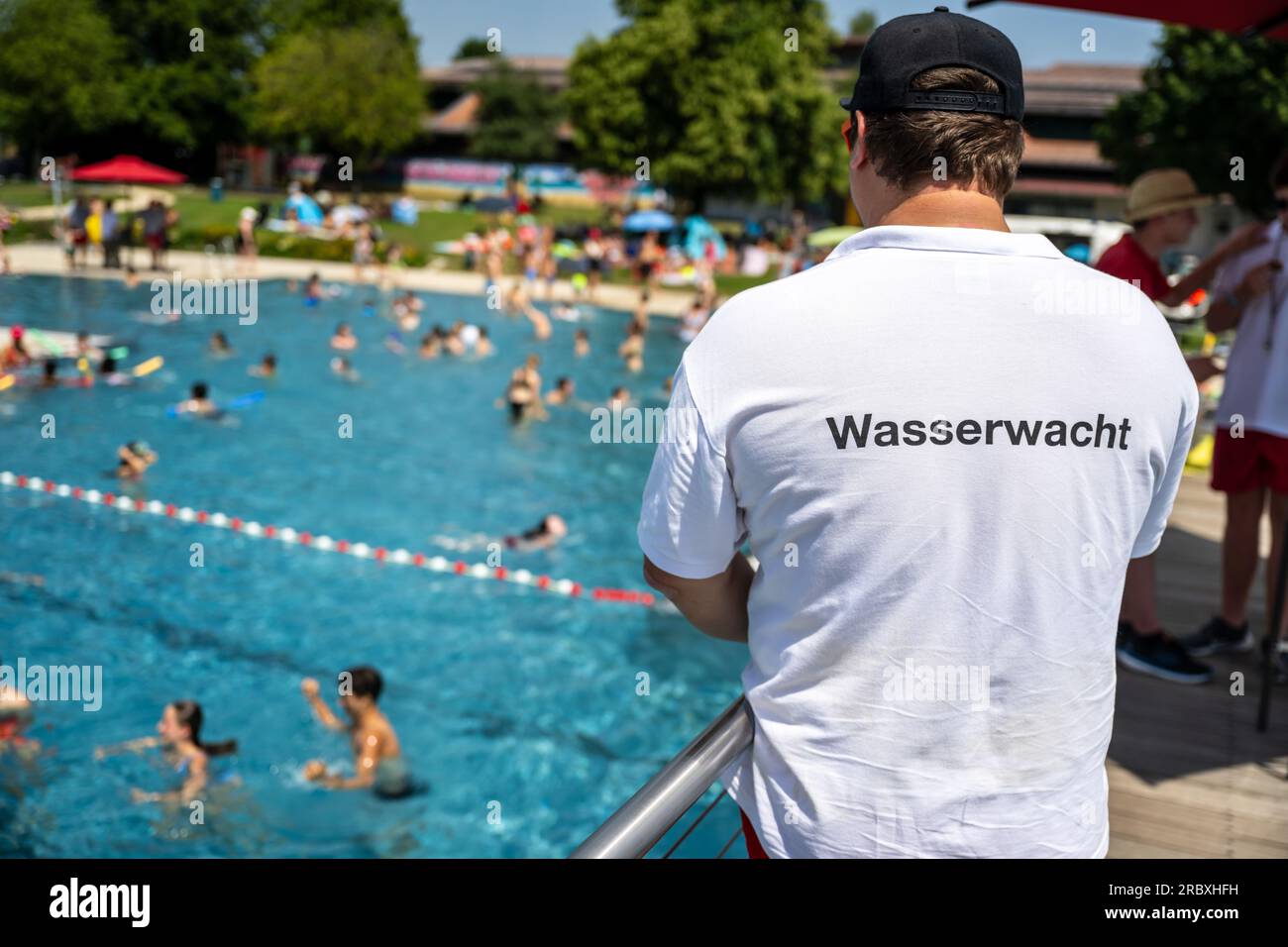 Grafing, Germany. 11th July, 2023. A man from Wasserwacht stands above