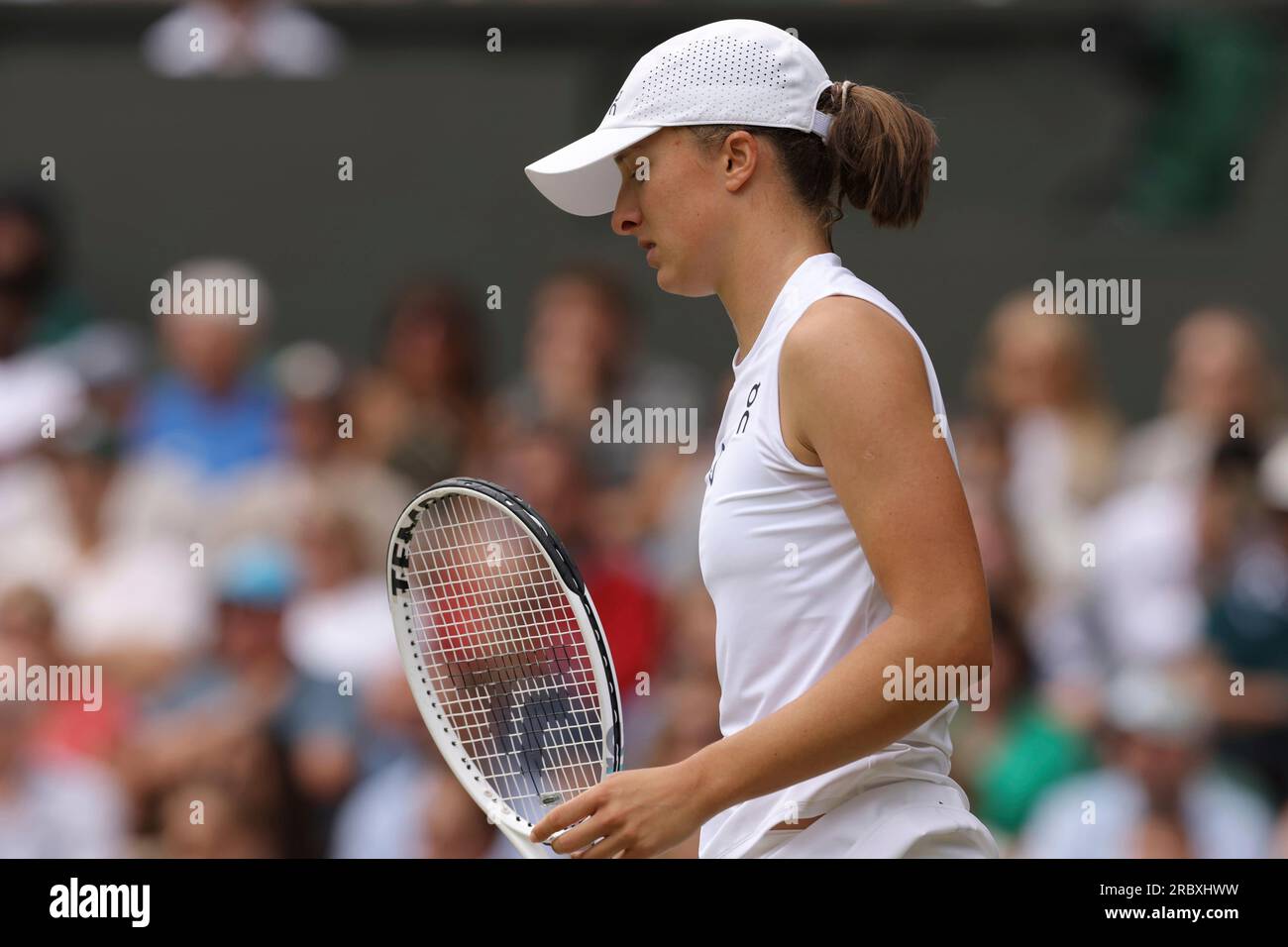 IGA SWIATEK of POLAND reacts during the Ladies Singles Quarter-finals match against ELINA SVITOLINA of UKRAINE in the Championships, Wimbledon at All England Lawn Tennis and Croquet Club in London, the United