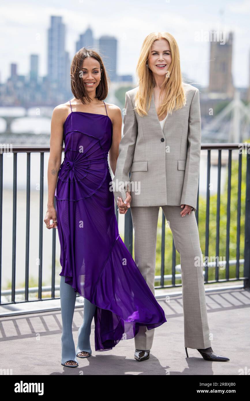 Zoe Saldana, left, and Nicole Kidman pose for photographers during a