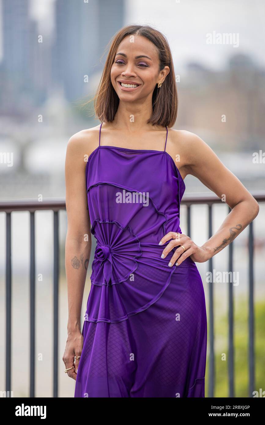 Zoe Saldana poses for photographers during a photo call for the TV
