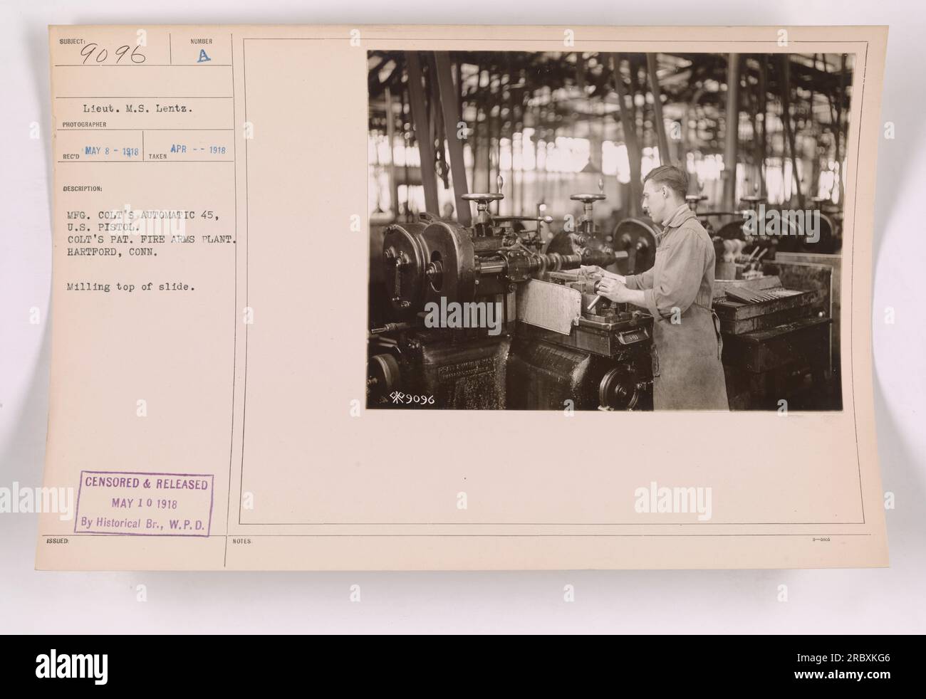 Lieutenant M.S. Lents photographed the milling process on the top of a slide for a Colt's Automatic 45, U.S. Pistol at the Colt's Pat. Fire Arms Plant in Hartford, Connecticut. The image was censored and released on May 10, 1918, by the Historical Branch of the War Plans Division. Stock Photo