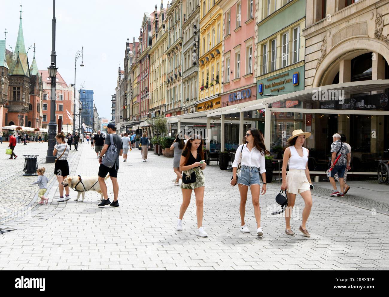 Young women, in the street, Rynek, Wroclaw, Poland Stock Photo