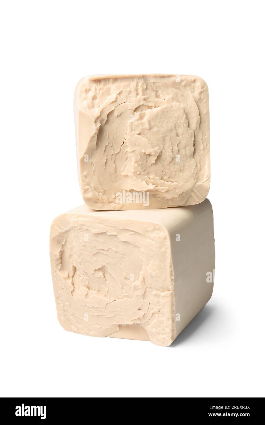 Blocks of compressed yeast isolated on white Stock Photo Alamy