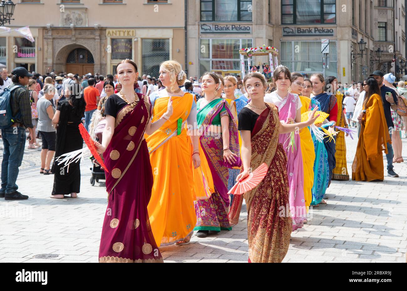 Hare Krishna singings march through the street Stock Photo - Alamy