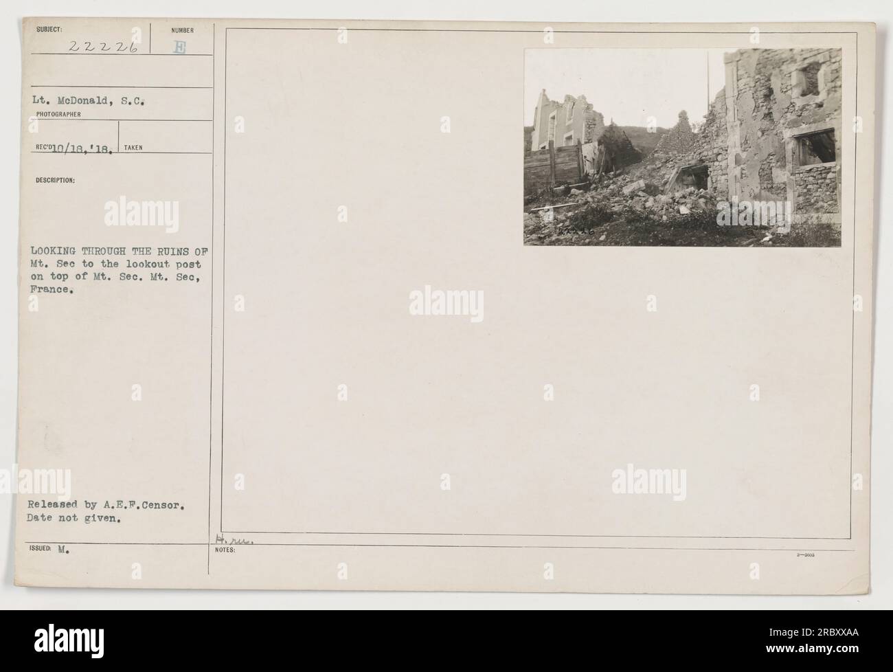 Lt. McDonald, S.C. examines the ruins of Mt. See, France. The photo shows the view from the lookout post on top of Mt. Sec. The image was released by the A.E.P. Censor, with no specific date provided. Stock Photo