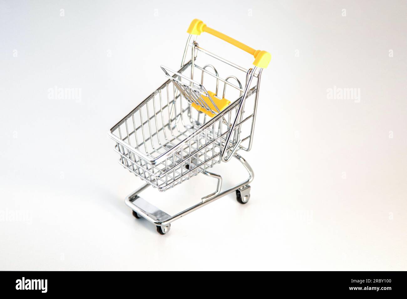 Empty supermarket shopping cart isolated on a white background Stock ...
