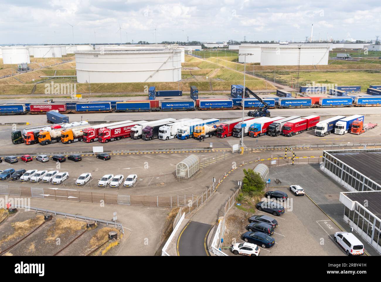 A row of trucks waiting to board a ferry to the UK in the port of Rotterdam, Holland, Europe Stock Photo