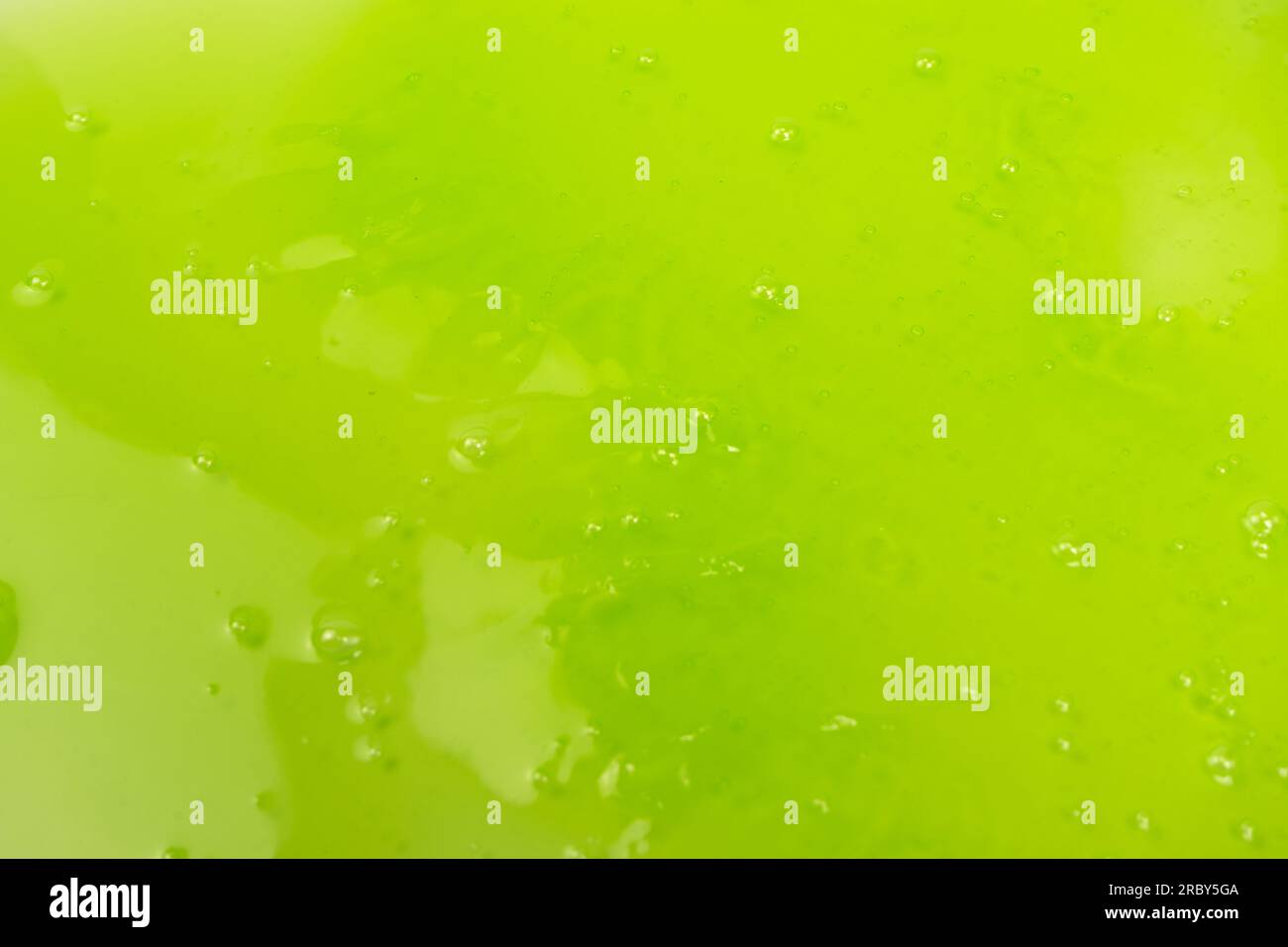 Green slime toy as a background. Top view Stock Photo - Alamy