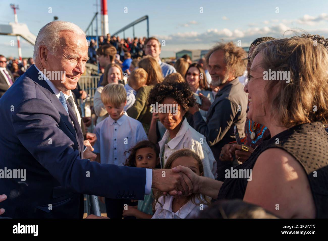 Vilnius, Lithuania. 10th July, 2023. U.S President Joe Biden, left, shakes hands with Lithuanian citizens welcoming him on arrival at Vilnius International Airport, July 10, 2023 in Vilnius, Lithuania. Credit: Adam Schultz/White House Photo/Alamy Live News Stock Photo