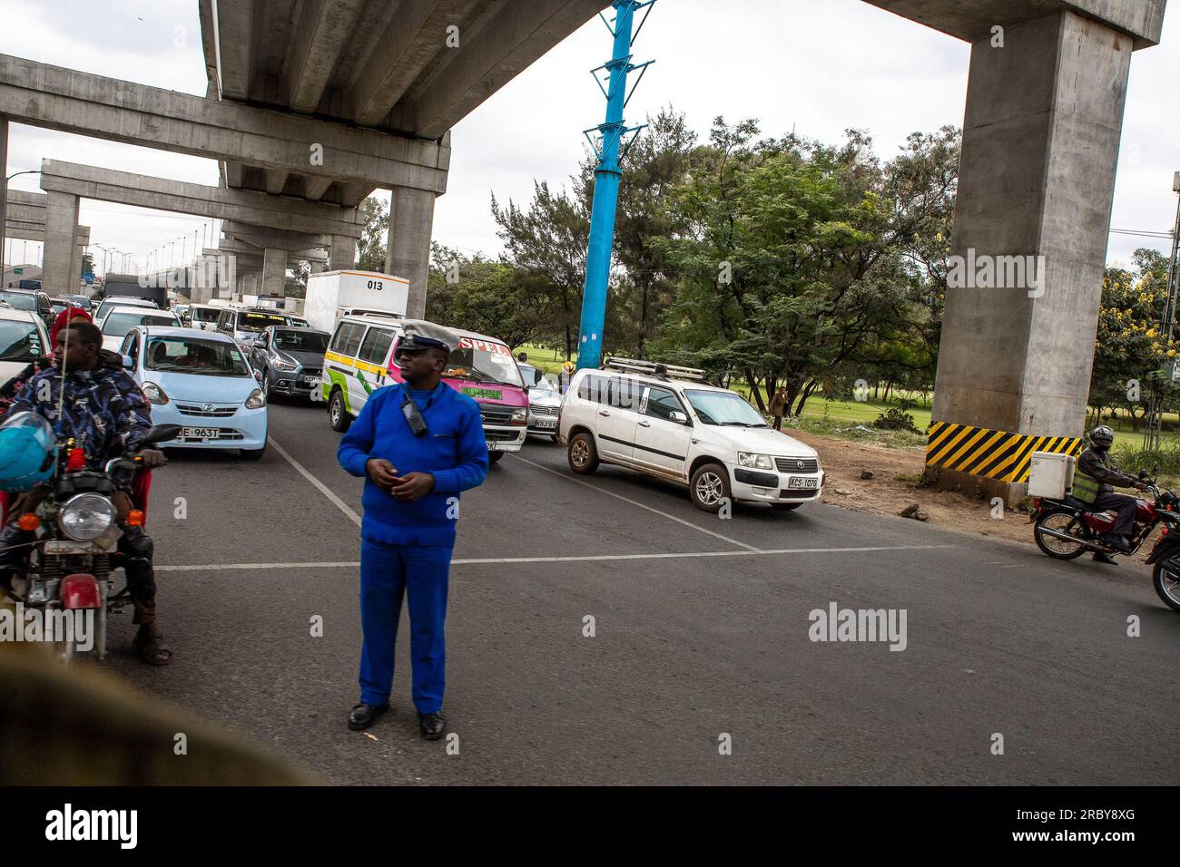 NAIROBI, KENYAJULY 04, 2023 A traffic police officer takes control of