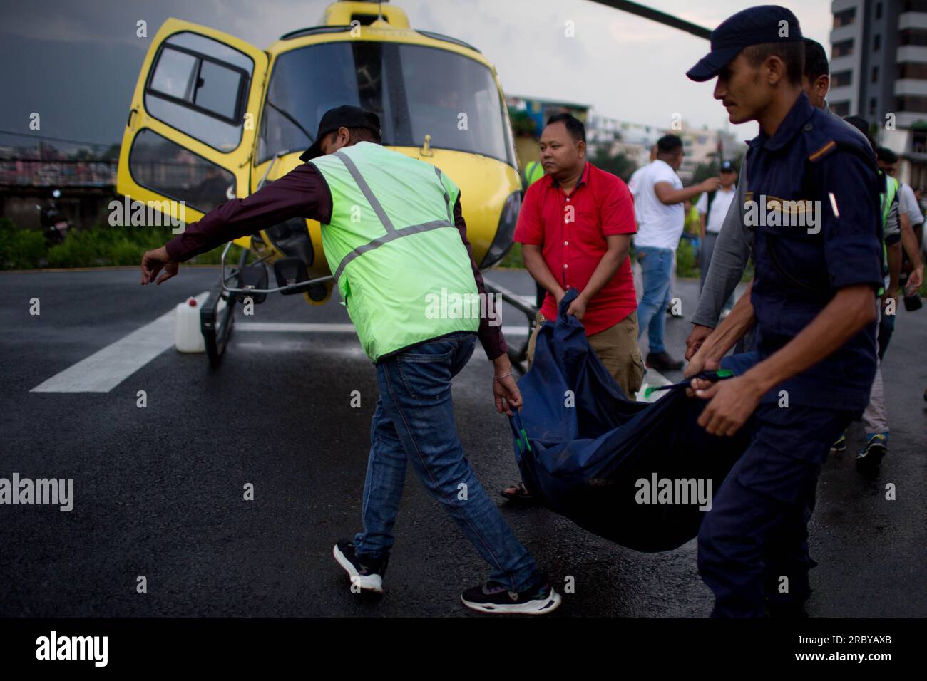 Kathmandu, Nepal. 11th July, 2023. Bodies of six victims of a helicopter crash are airlifted to Kathmandu, Nepal, on July 11, 2023. All six people, including five Mexican tourists and a Nepali pilot, were killed after their helicopter crashed on Tuesday in a mountain district in eastern Nepal, the authorities said. Credit: Sulav Shrestha/Xinhua/Alamy Live News Stock Photo