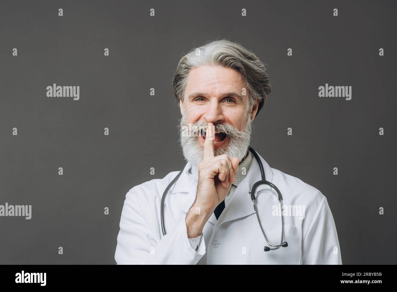 Elderly doctor in white hi-res stock photography and images - Alamy