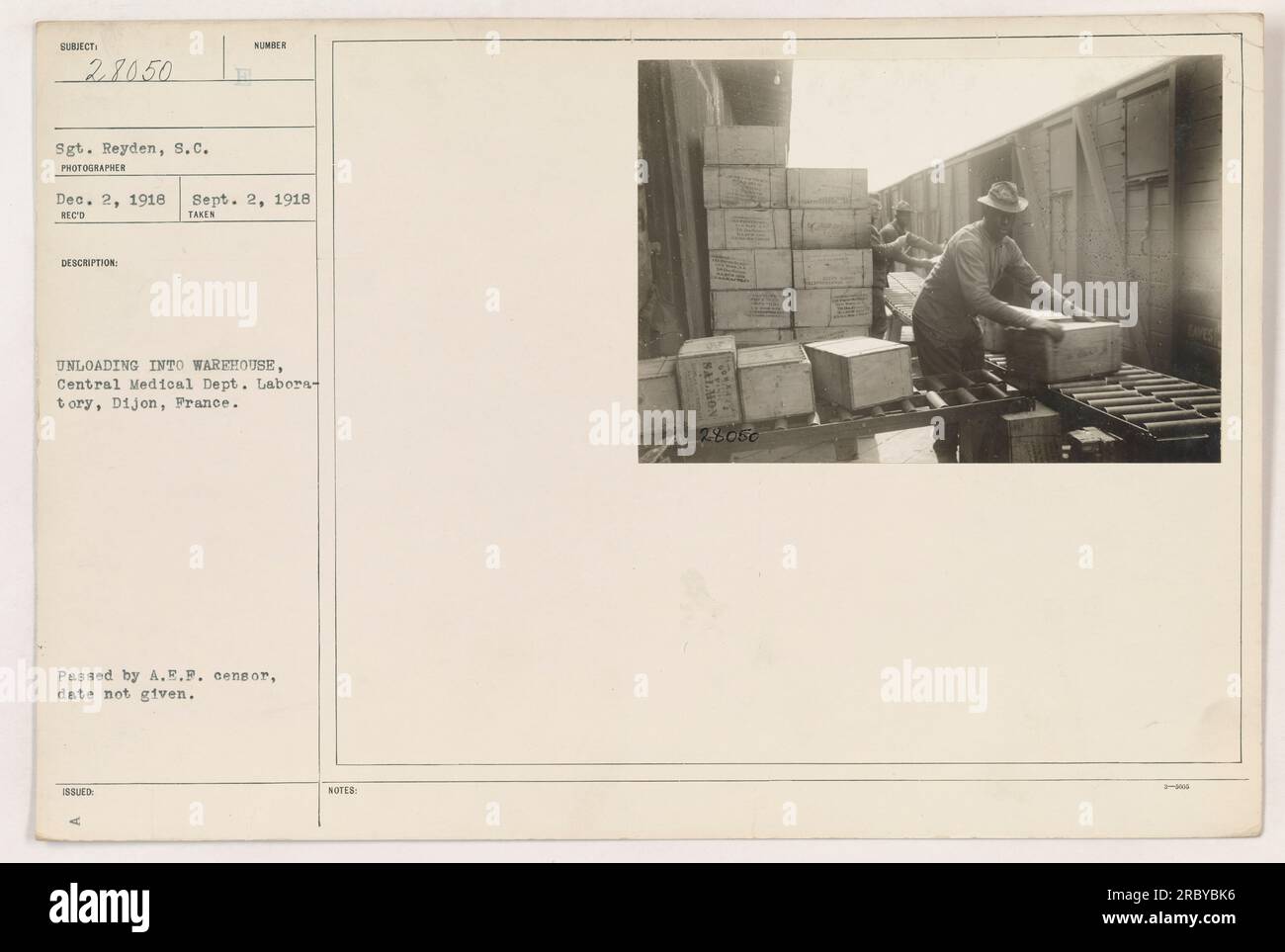 American soldiers unloading supplies into a warehouse at the Central ...