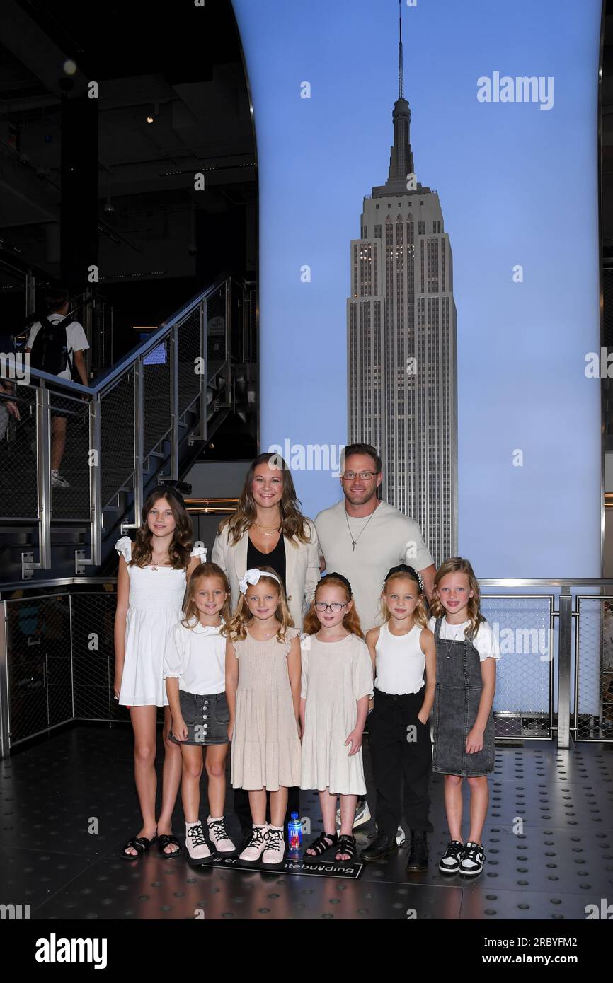 New York, USA. 11th July, 2023. The Busby family, including 