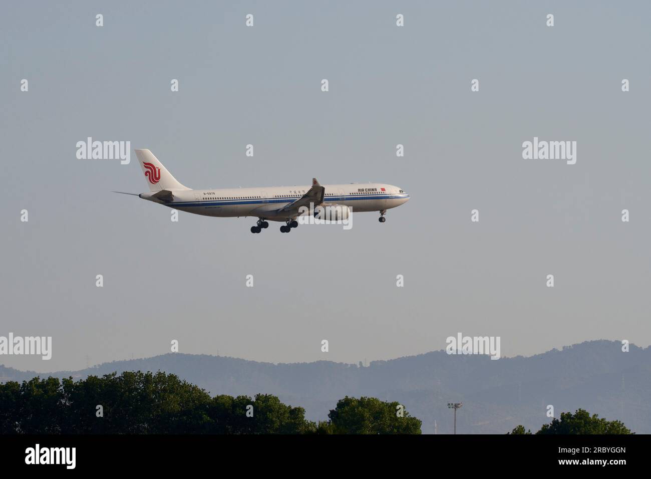 An air china plane company  landing at Barcelona airport Stock Photo