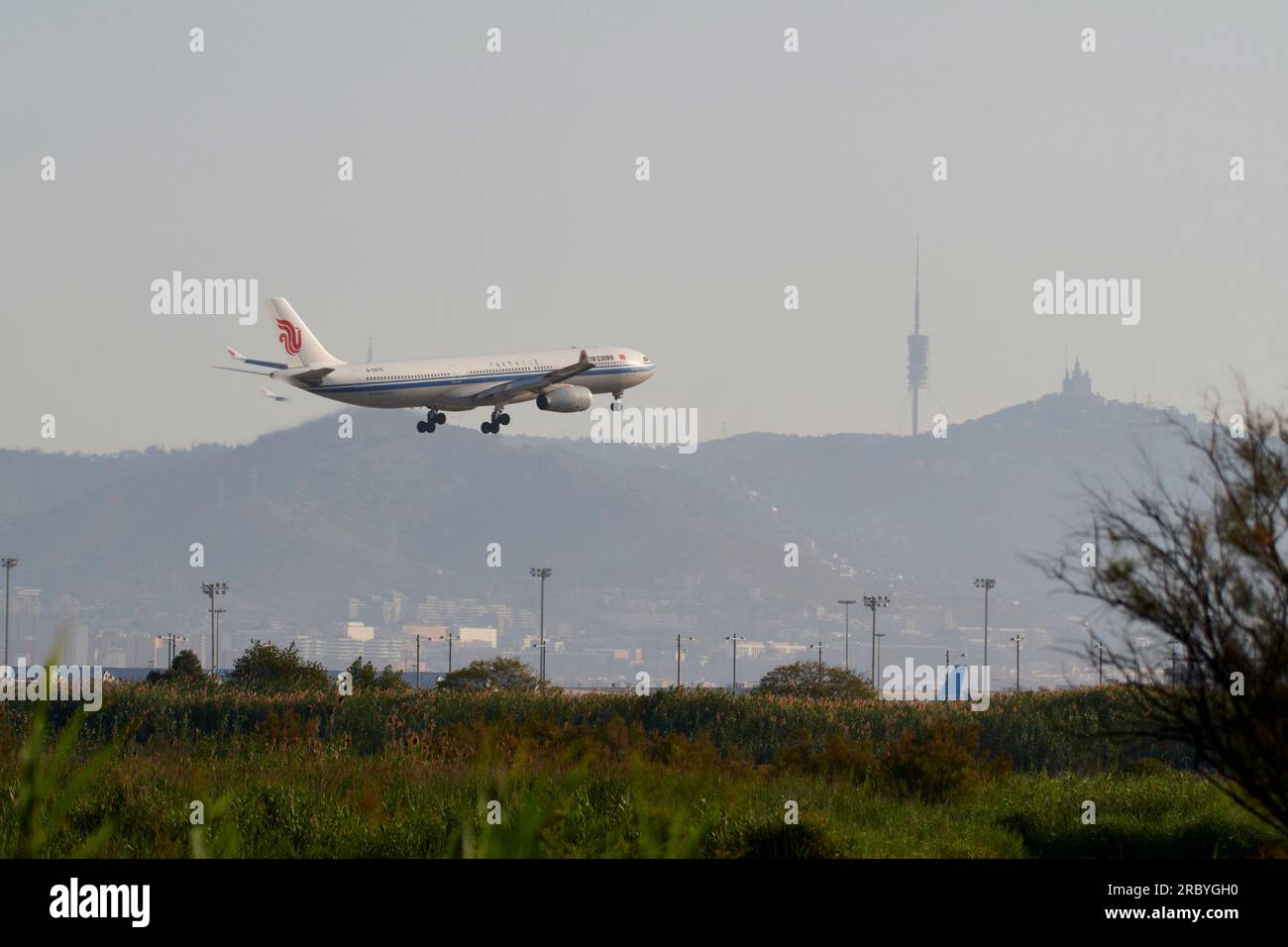 An air china plane company  landing at Barcelona airport Stock Photo