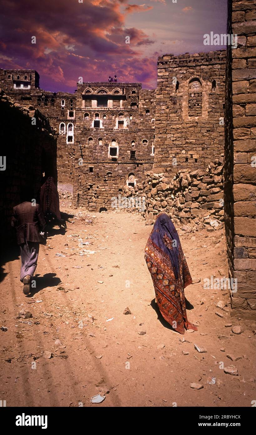 Asia Yemen Thula woman walks in classic Sana'ani Sitarah dress Stock Photo