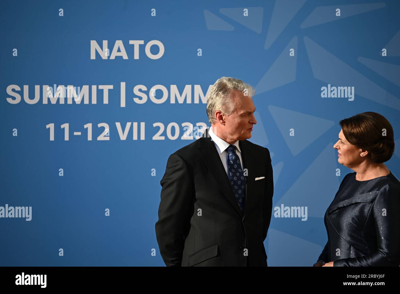 Lithuania's President Gitanas Nauseda and his wife Diana Nausediene wait to greet guests arriving for the social dinner during the Nato summit in Vilnius, Lithuania. Picture date: Tuesday July 11, 2023. Stock Photo