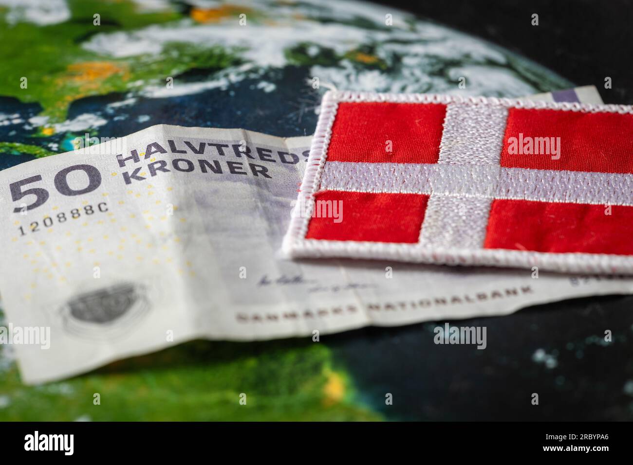 Denmark Money, 50 danish kroner banknote together with national flag, Financial and business concept Stock Photo