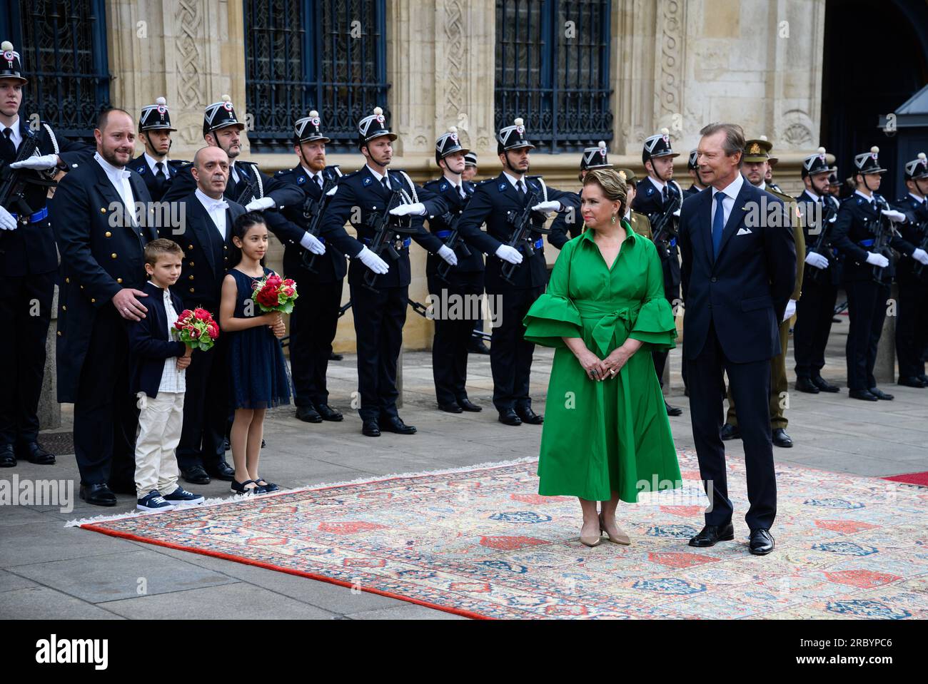 10 July 2023, Luxembourg, Luxemburg: Grand Duke Henri of Luxembourg and Grand Duchess Maria Teresa of Luxembourg are waiting at the Grand Ducal Palace to greet President Steinmeier and his wife with military honors. President Steinmeier and his wife are in Luxembourg for a two-day official visit. Photo: Bernd von Jutrczenka/dpa Stock Photo