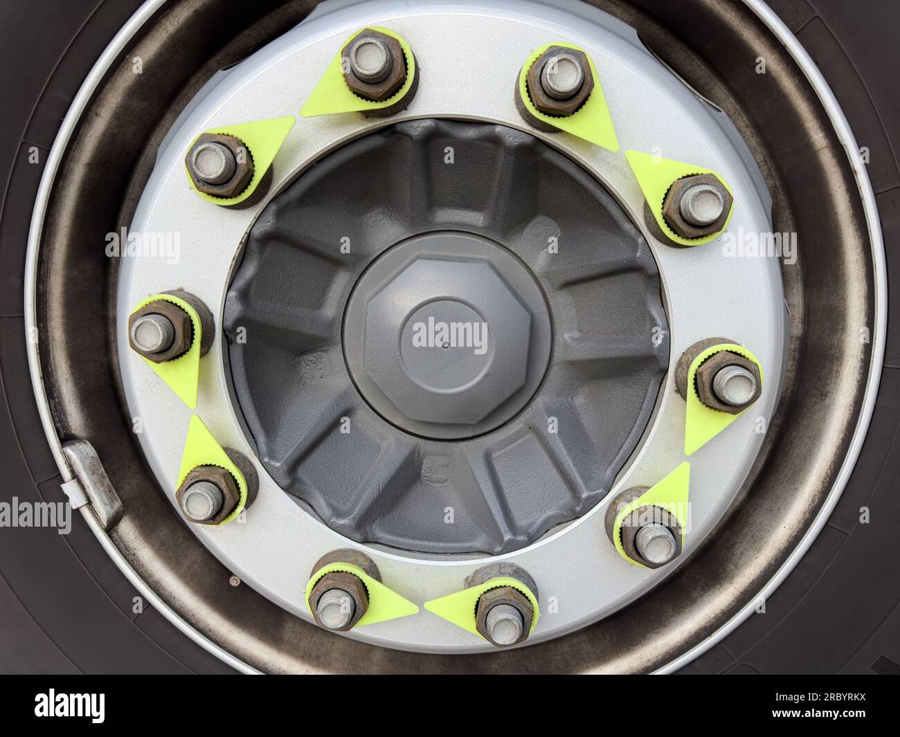 Truck wheel and tire and nuts indicators shows no defects in tension nut Stock Photo Alamy