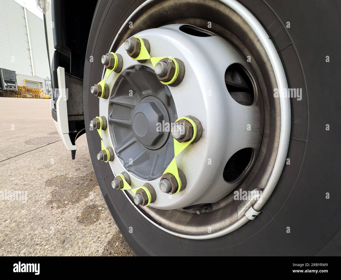 Truck wheel and tire and nuts indicators shows no defects in tension nut Stock Photo Alamy