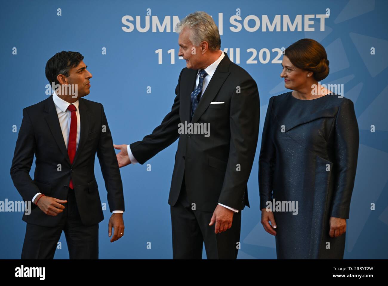 Prime Minister Rishi Sunak (left), is greeted by Lithuania's President Gitanas Nauseda and his wife Diana Nausediene for the social dinner during the Nato summit in Vilnius, Lithuania. Picture date: Tuesday July 11, 2023. Stock Photo