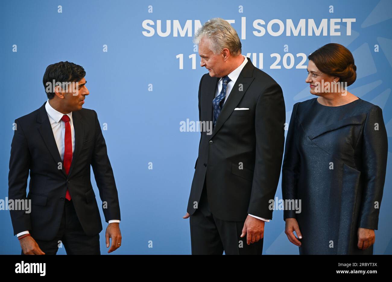 Prime Minister Rishi Sunak (left), is greeted by Lithuania's President Gitanas Nauseda and his wife Diana Nausediene for the social dinner during the Nato summit in Vilnius, Lithuania. Picture date: Tuesday July 11, 2023. Stock Photo