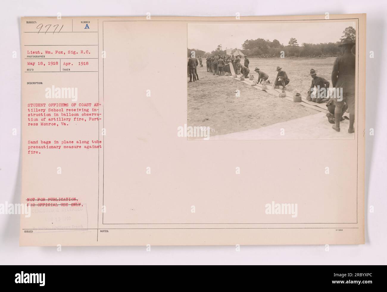 Student officers of the Coast Artillery School at Fortress Monroe, Virginia, receiving instruction in balloon observation of artillery fire. Sandbags are placed along the tube as a precautionary measure against fire. This photograph was taken on April 1918 by Lieutenant William Fox, Signal Reserve Corps. Stock Photo