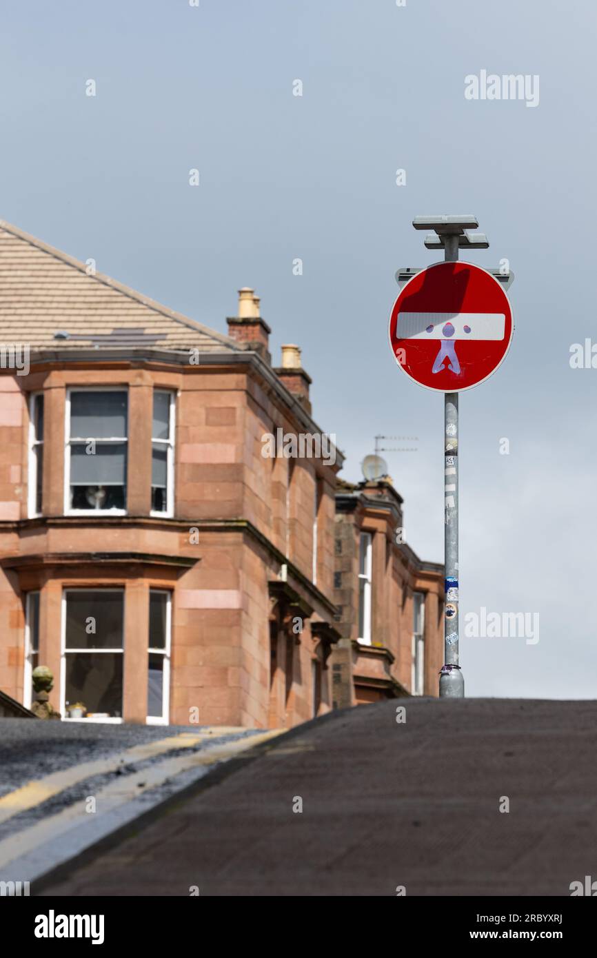 Hacked street sign hi-res stock photography and images - Alamy