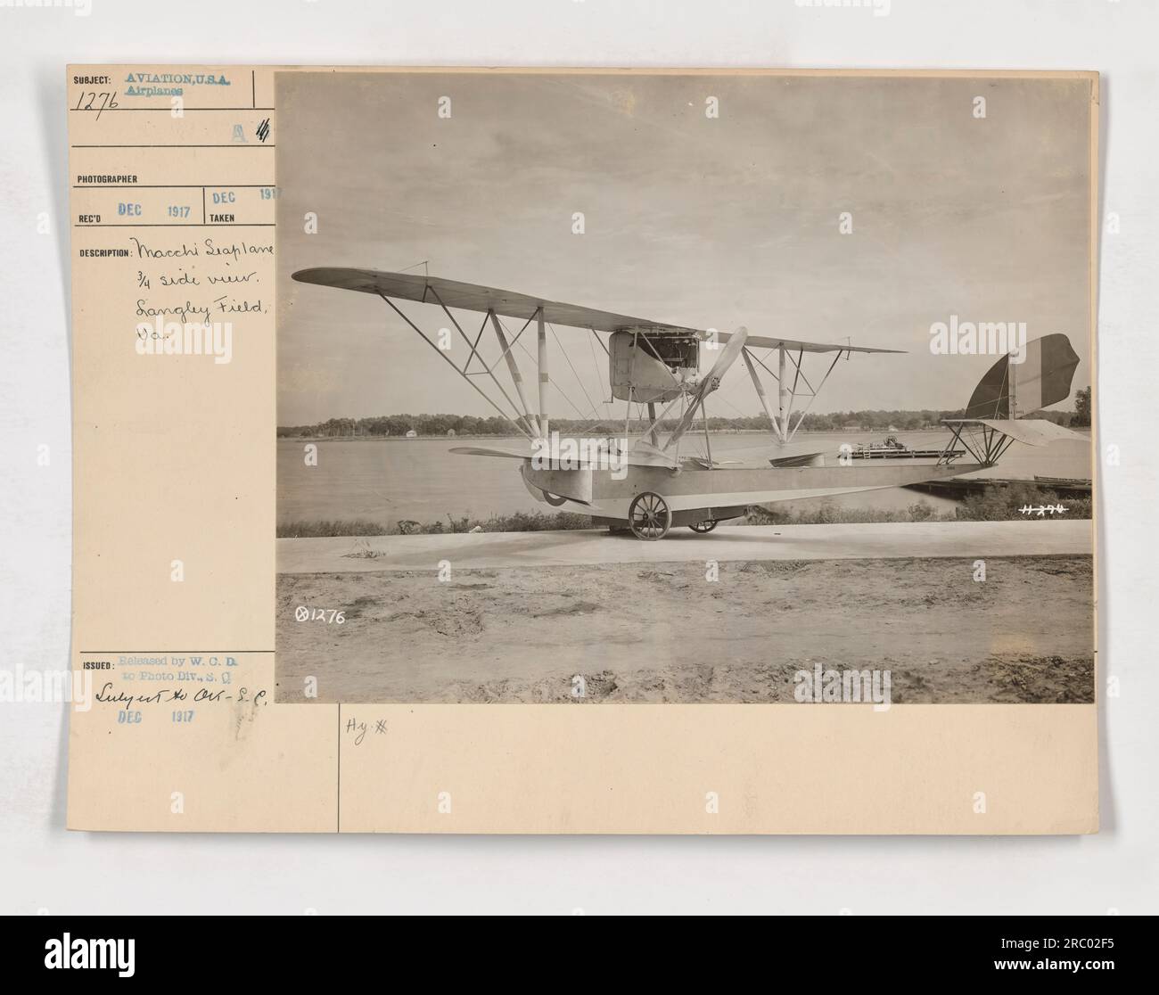 A Macchi seaplane is seen in a 3/4 side view at Langley Field, Virginia in 1917. The photograph was taken at Sangley Field. It was released by W.O.D. to the Photo Division Supply Officer on December 199, and issued for distribution in December 1917. Reference number: 111-SC-1276. Stock Photo