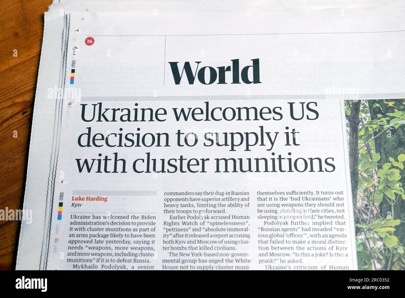 'Ukraine welcomes US decision to supply it with cluster munitions' Guardian newspaper headline Russia Ukraine War weapons article 8th July 2023 UK Stock Photo