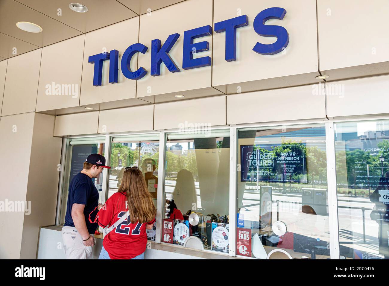 Atlanta Georgia,College Football Hall of Fame,tickets ticket window,couple purchasing buying Stock Photo