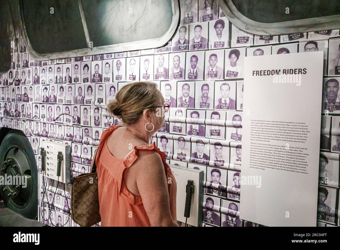 Atlanta Georgia,National Center for Civil and Human Rights,inside interior exhibit,woman reading Freedom Riders Stock Photo