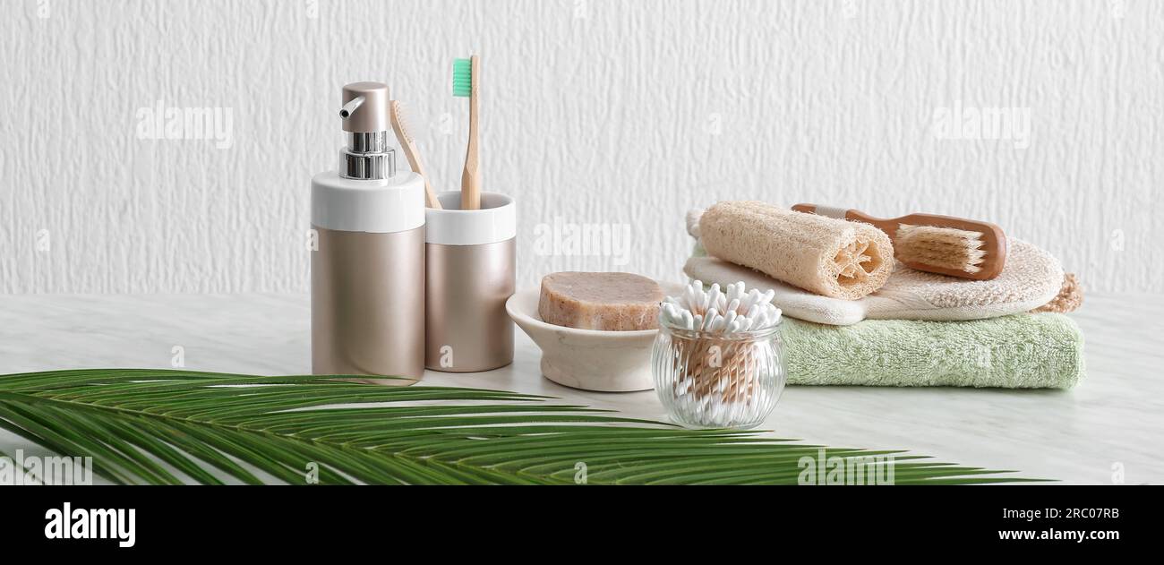 Natural bath accessories on table in light bathroom Stock Photo Alamy