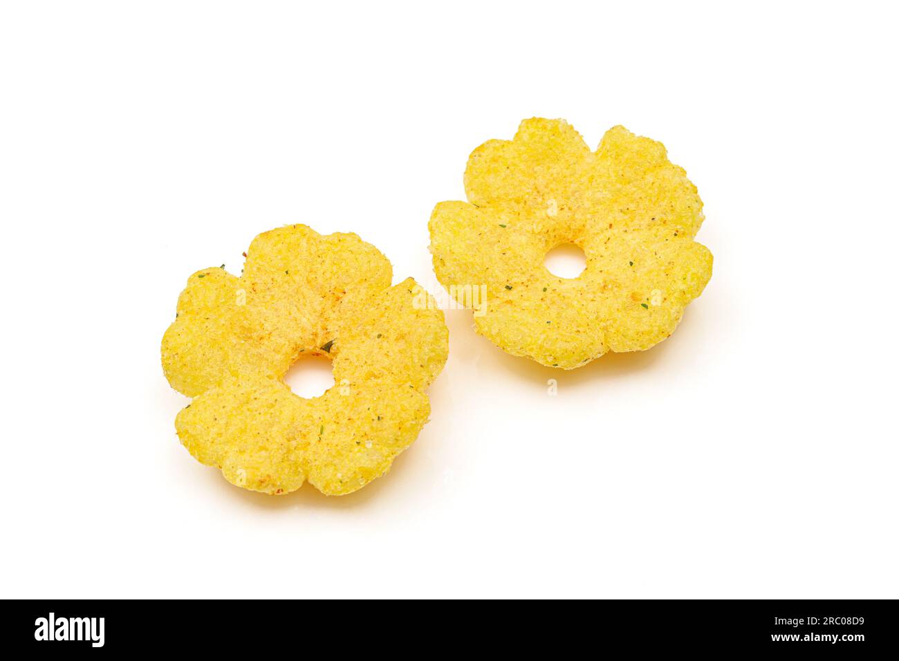 Two flower shaped salty and crispy flips snack isolated on white background Stock Photo