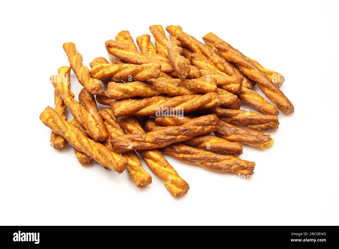 Group of salty and  twisted pretzel sticks isolated on white background. Italian snack Stock Photo