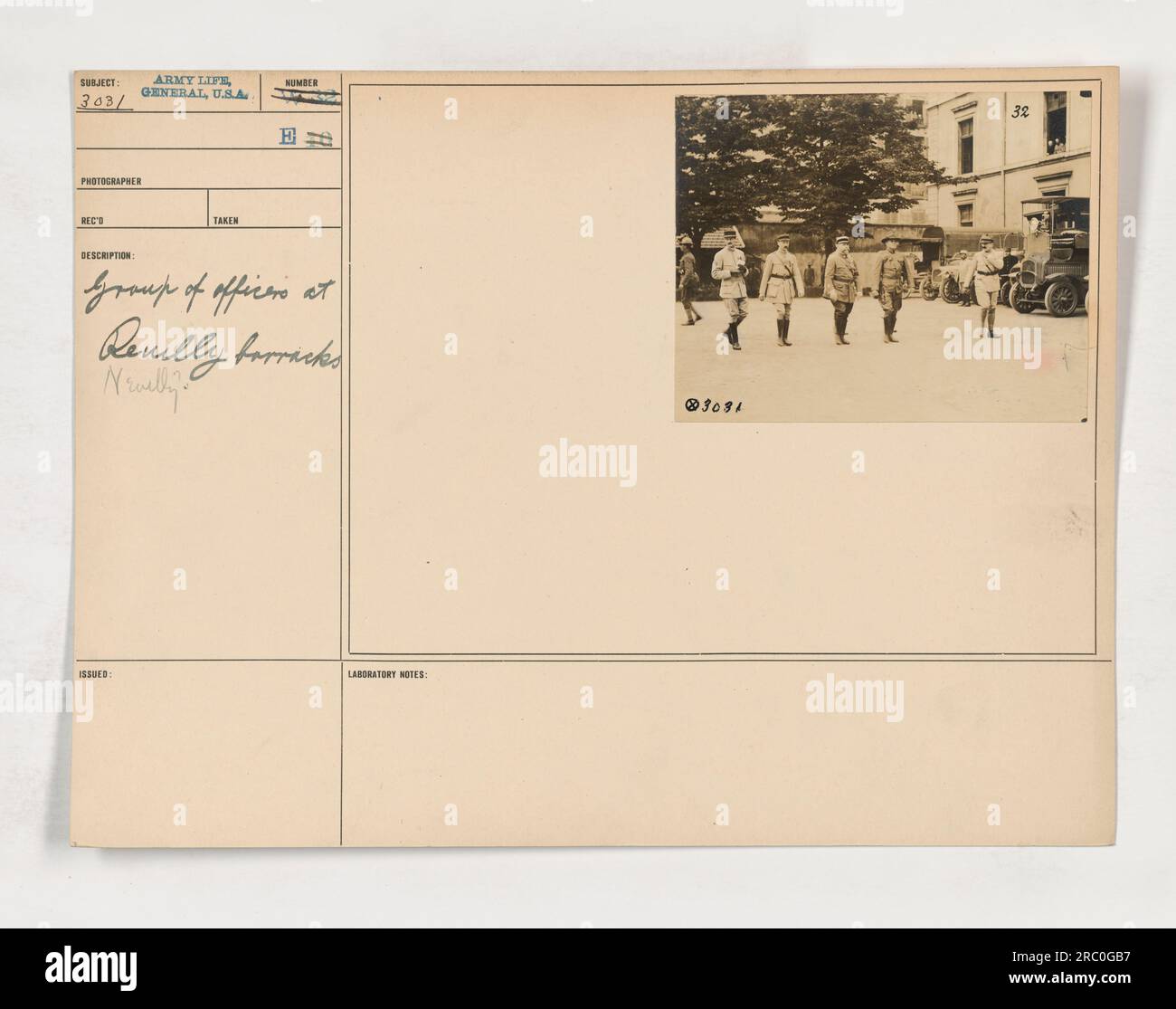 Group of officers posing for a photograph at Reuilly barracks during World War I. The image captures the army life and camaraderie shared by the officers. This photograph was taken by the USA photographer at the Revelly barracks and was issued as number 3031. Laboratory notes indicate that the photo was processed at Newelly. Stock Photo