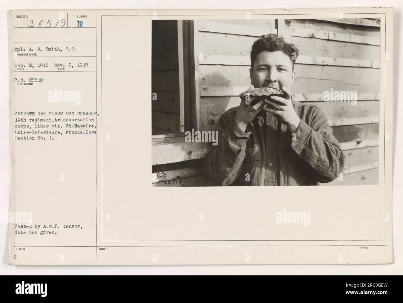 Private 1st Class Dan Donahue of the 19th Regiment, Transportation Corps, enjoys pie. The photograph was taken in St-Nazaire, Loire-Inferieure, France, as part of Base Section No. 1. It has been approved by the A.E.F censor, but the exact date is unknown. Stock Photo