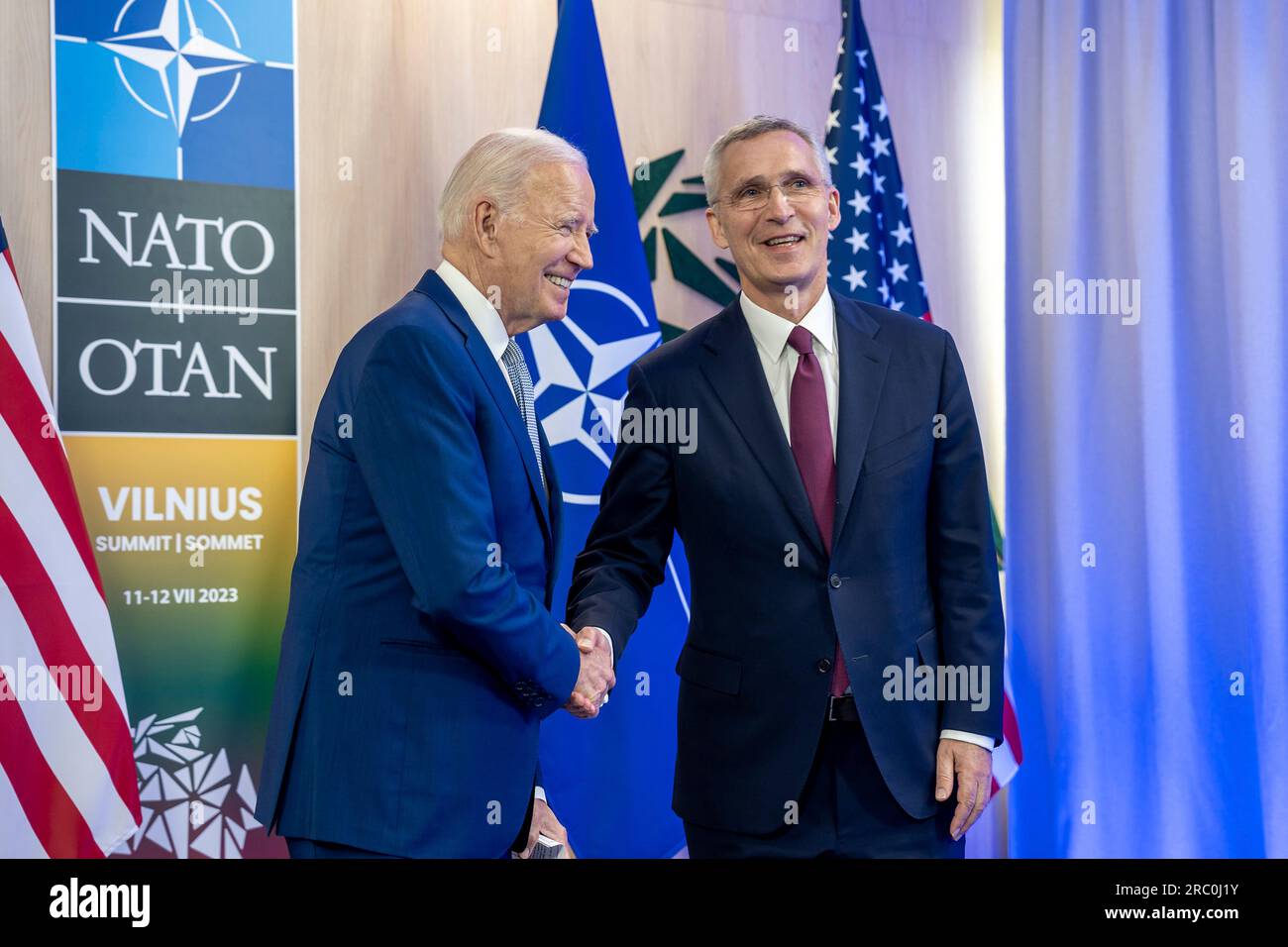 Vilnius, Lithuania. 11th July, 2023. U.S President Joe Biden, left, shakes hands with NATO Secretary General Jens Stoltenberg, right, before a bilateral meeting on the sidelines of the NATO Summit at the Lithuanian Exhibition and Congress Center, July 11, 2023 in Vilnius, Lithuania. Credit: Adam Schultz/White House Photo/Alamy Live News Stock Photo