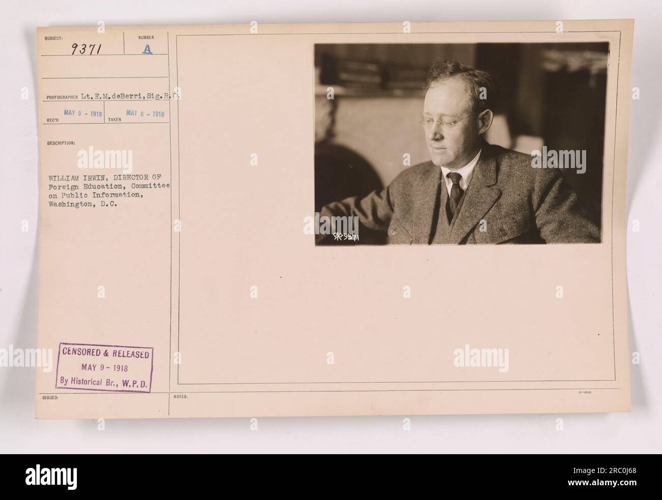 A photograph taken by Lieutenant E.M. deBerri, Sig.R.C., on May 9, 1918. The image features William Irwin, the Director of Foreign Education for the Committee on Public Information in Washington, D.C. The photograph was censored and released by the Historical Branch, W.P.D. It is labeled as subject 'REC'D 9371' with the description 'BLED NUNDER A TAKES MAY-1918.' Stock Photo