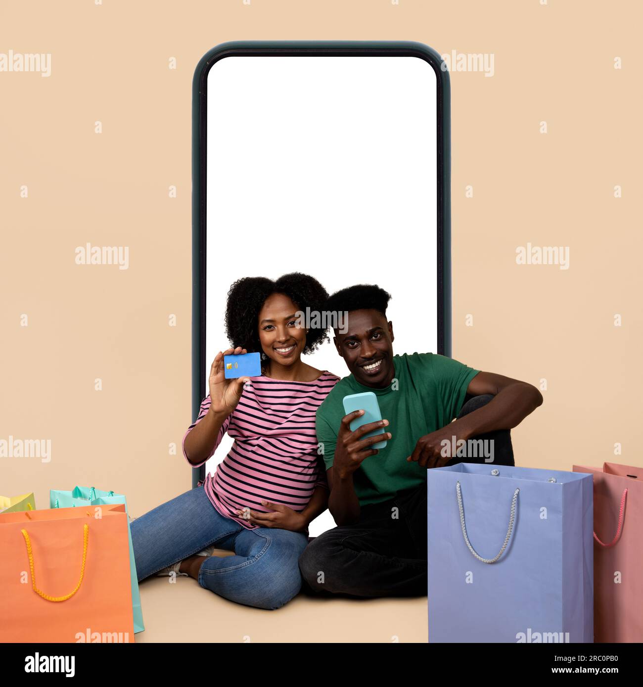 Happy millennial african american husband and wife with belly with ...