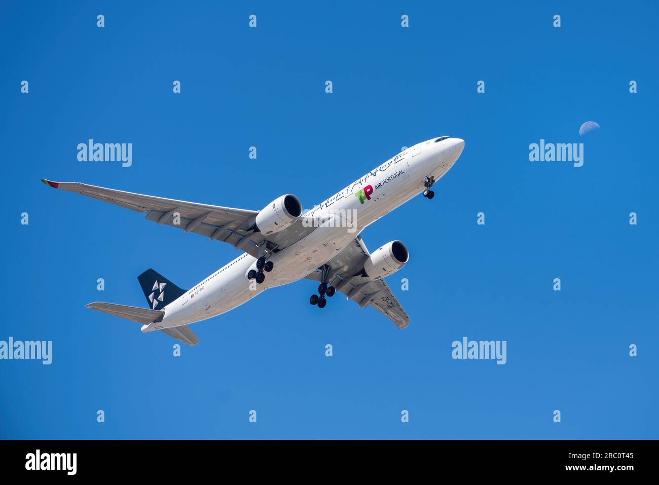 Lisbon, Portugal - July 12, 2023: Portuguese company Tap with aircraft Airbus A330-941 approaching to land at Lisbon International Airport against Stock Photo