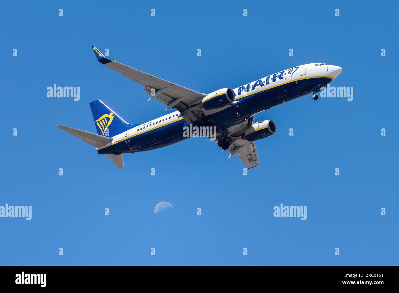 Lisbon, Portugal - July 12, 2023: Irish air company Ryanair with aircraft Boeing 737-8AS approaching to land at Lisbon International Airport against Stock Photo