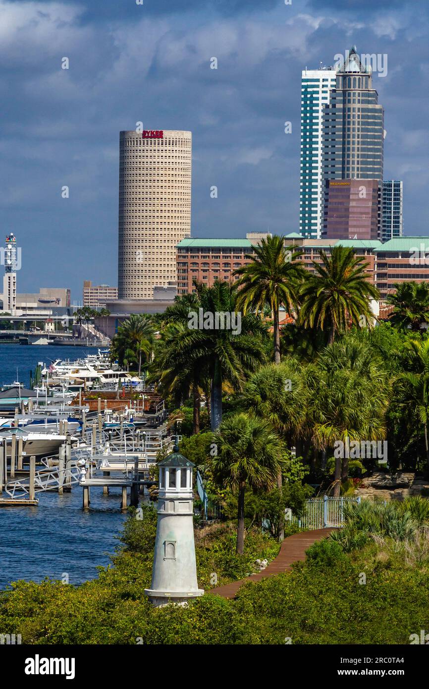 It's actually on its own narrow point of land at the tip of one of Tampa's most desirable pieces of real estate - Harbour Island.  The lighthouse - an Stock Photo