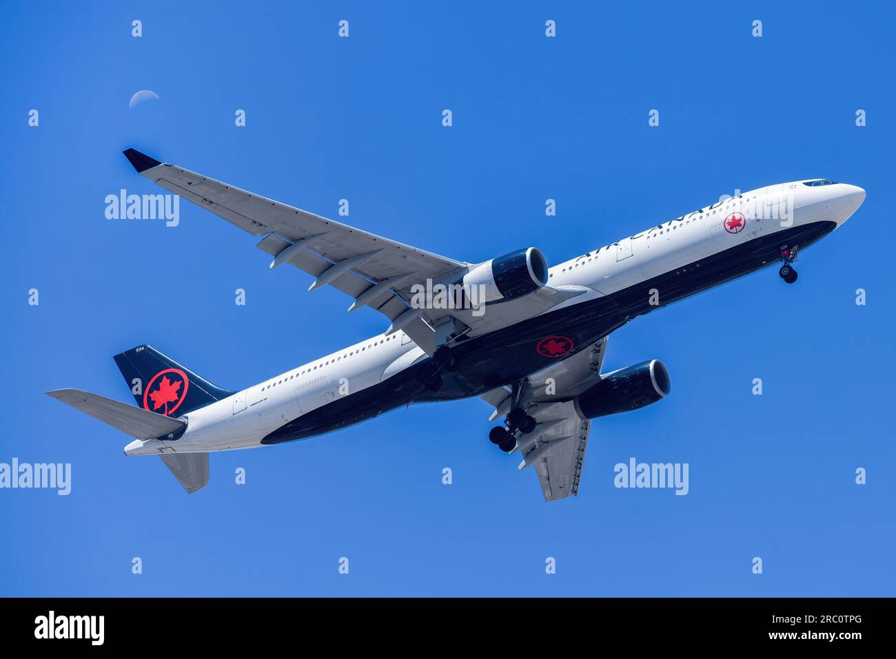 Lisbon, Portugal - July 12, 2023: Canadian air company Air Canada with aircraft Airbus A330-300 approaching to land at Lisbon International Airport Stock Photo